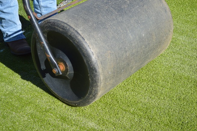 Edmonton artificial grass installation - top layer rolled